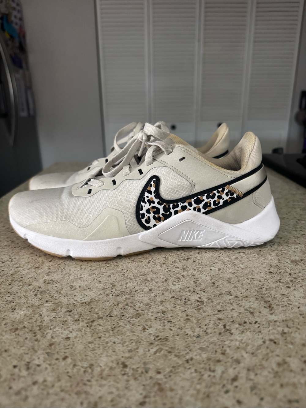 Nike Beige Sneakers with Leopard-Print Swoosh
